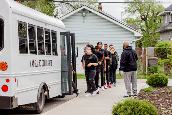 Vanguard scholars boarding the Vanguard bus.